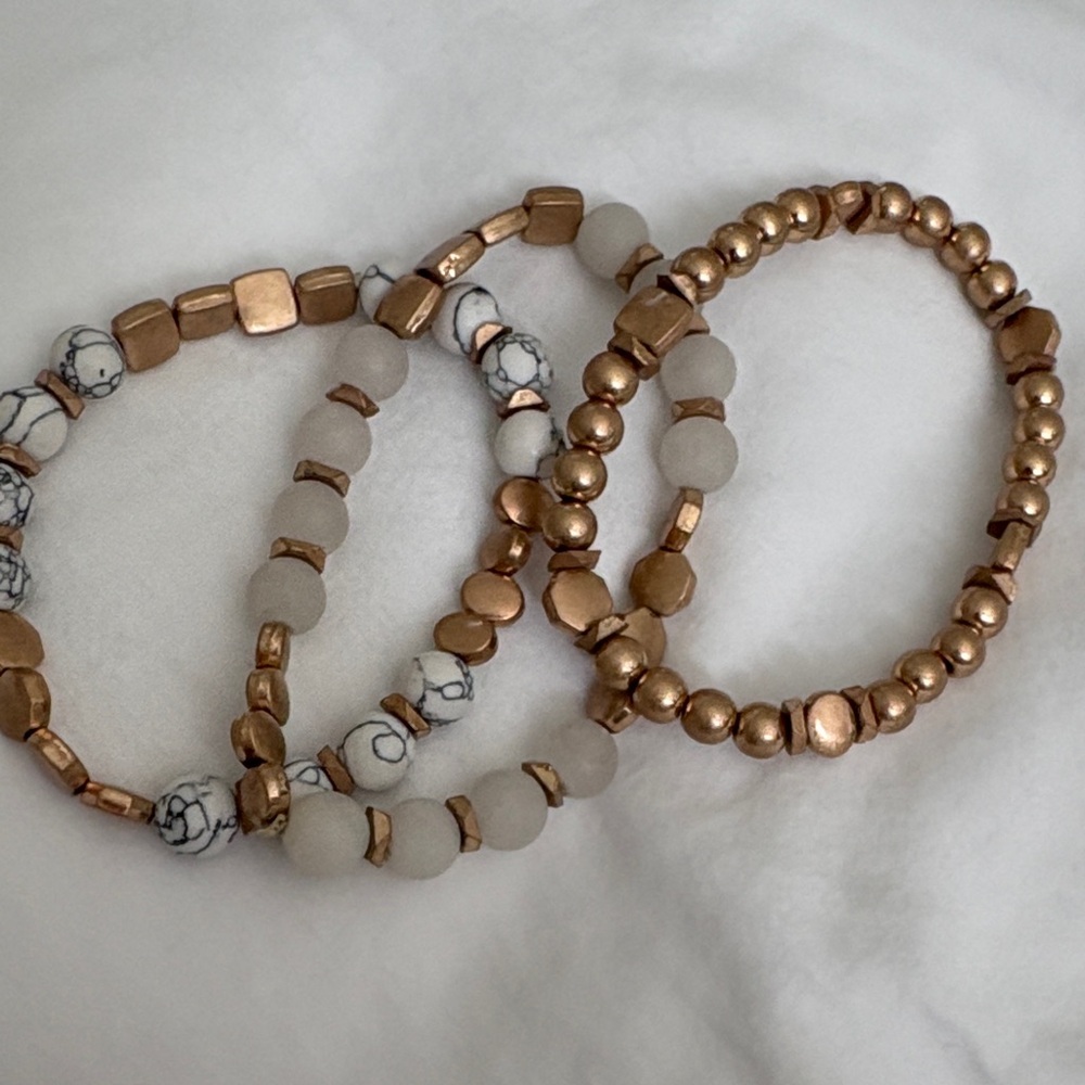 Set of 3 gold tone stretch bracelets